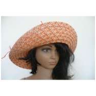 Woman hat from paper with knitted flower