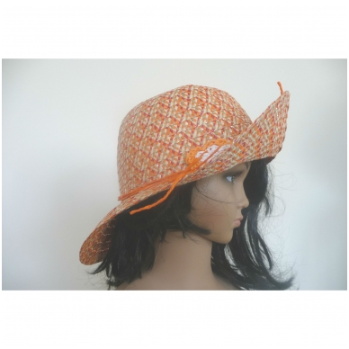 Woman hat from paper with knitted flower 3